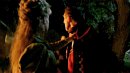Darla grabs the man by the throat