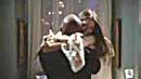 Happy Fred in  Gunn's arms