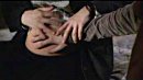 Cordy puts Connor's hand on  her belly