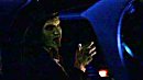 Lorne inside the limo